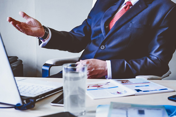 Photo of a business man leading a meeting