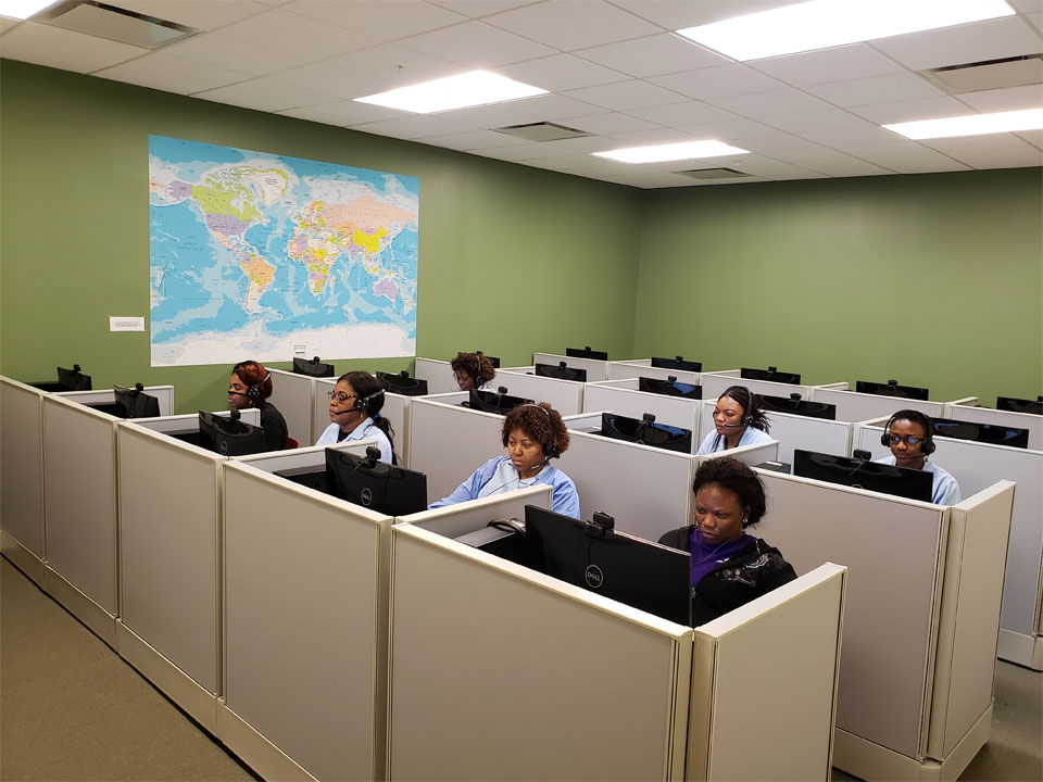 A photo of a computer lab with students learning