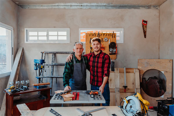 Photo of a father and son construction team