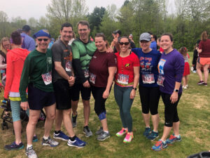 Group photo of Clark employees at a race