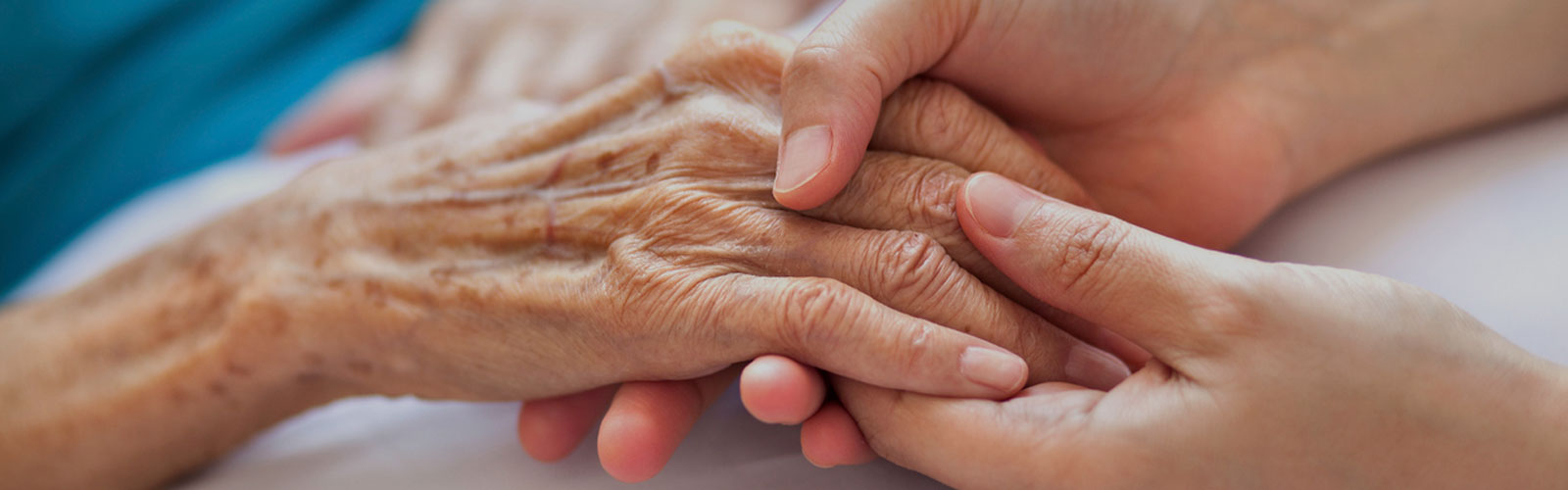 Photo of hand holding used for the Long-Term Care Insurance page